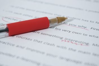 close up of text with red pen